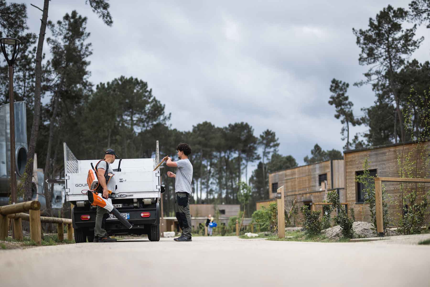 G6 with hooklift for maintenance operations at a tourist resort